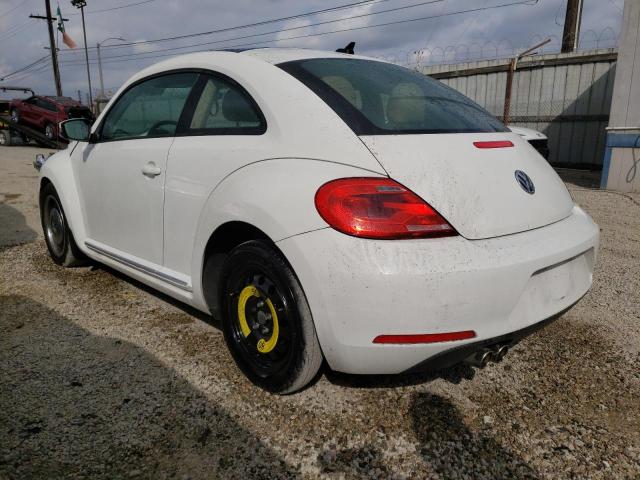 Obraz 2 z Volkswagen Beetle 2013 z VIN 3VWJP7AT3DM691090