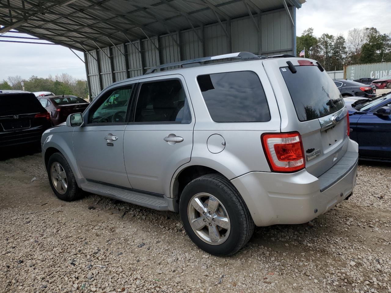 Image 2 of 2010 FORD ESCAPE LIMITED 2010 with VIN 1FMCU0EG4AKA95235
