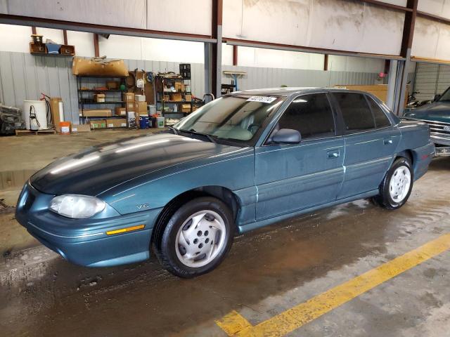 Image 1 of 1997 PONTIAC GRAND AM SE 1997 with VIN 1G2NE52M1VC815967