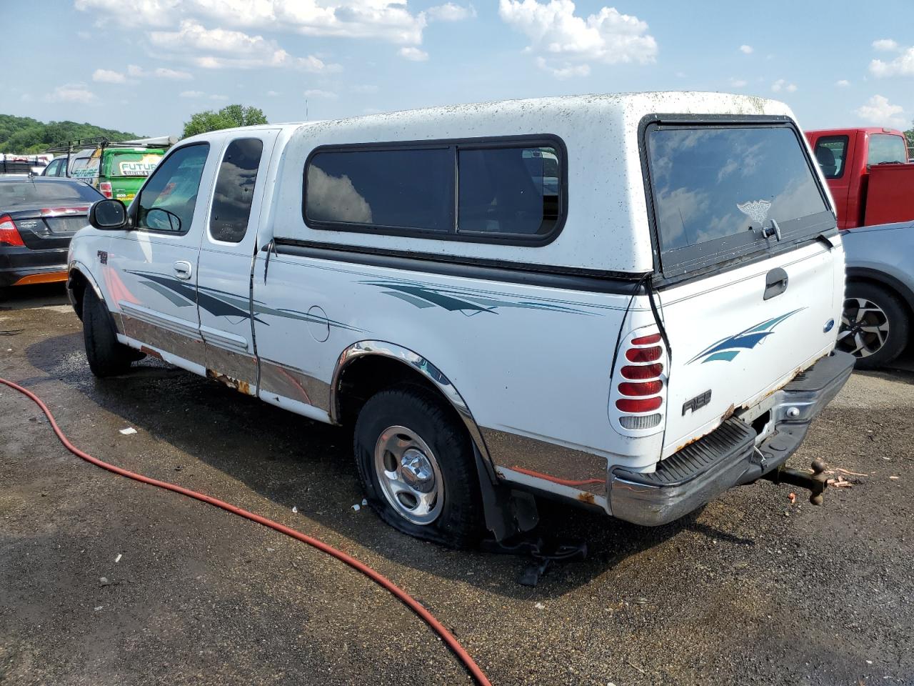 Image 2 of 1999 FORD F150  1999 with VIN 1FTRX17L3XNC16575