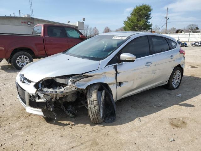 Image 1 of 2012 FORD FOCUS TITANIUM 2012 with VIN 1FAHP3N22CL370594