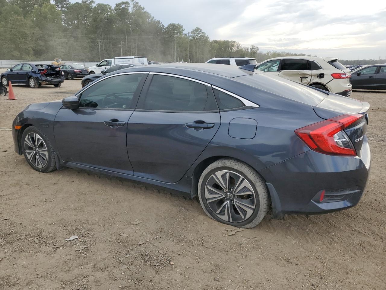 Изображение 2 Honda Civic Exl 2018 с VIN JHMFC1F78JX017003