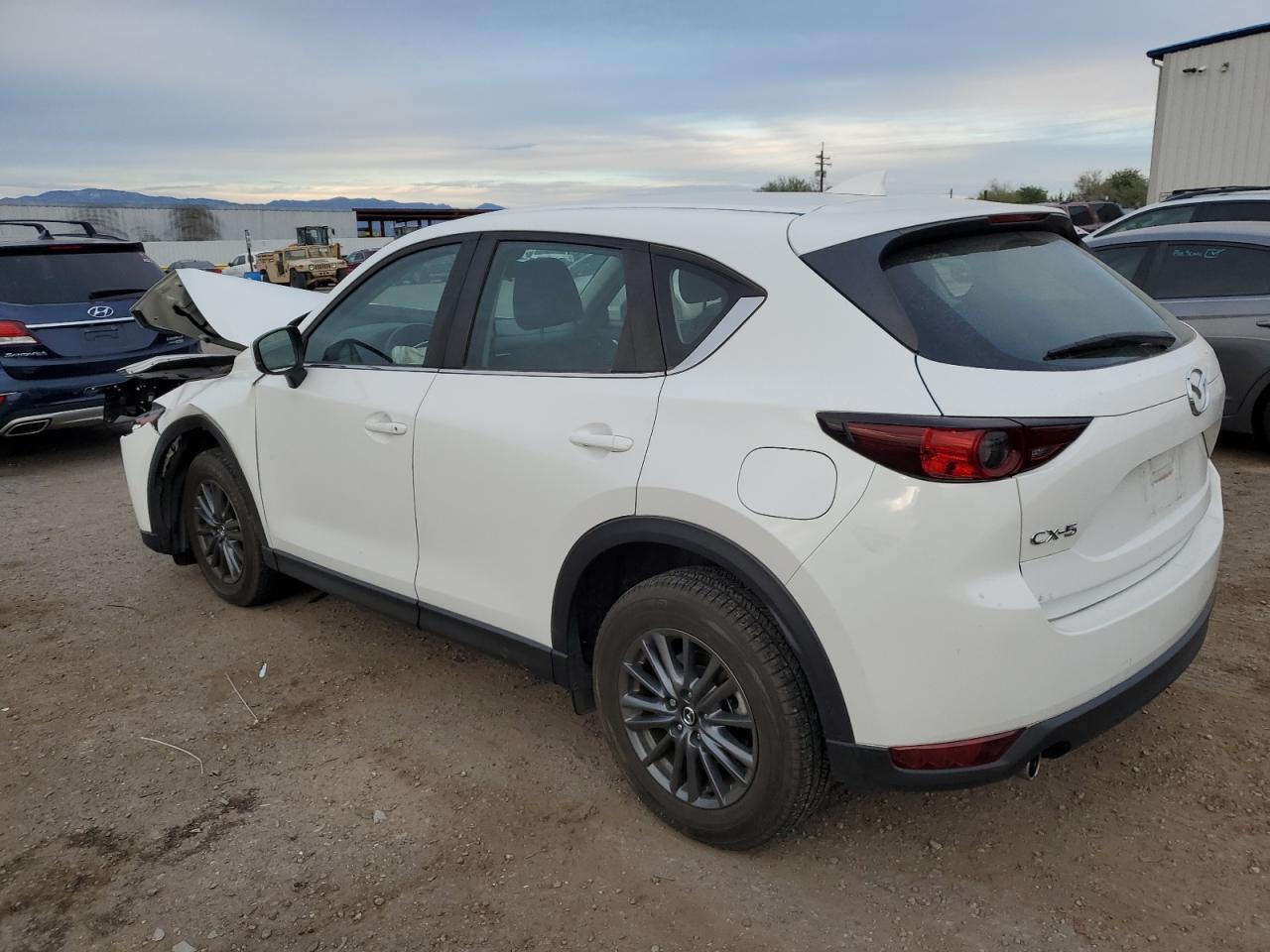 Image 2 of 2021 MAZDA CX-5 SPORT 2021 with VIN JM3KFABM7M0325884