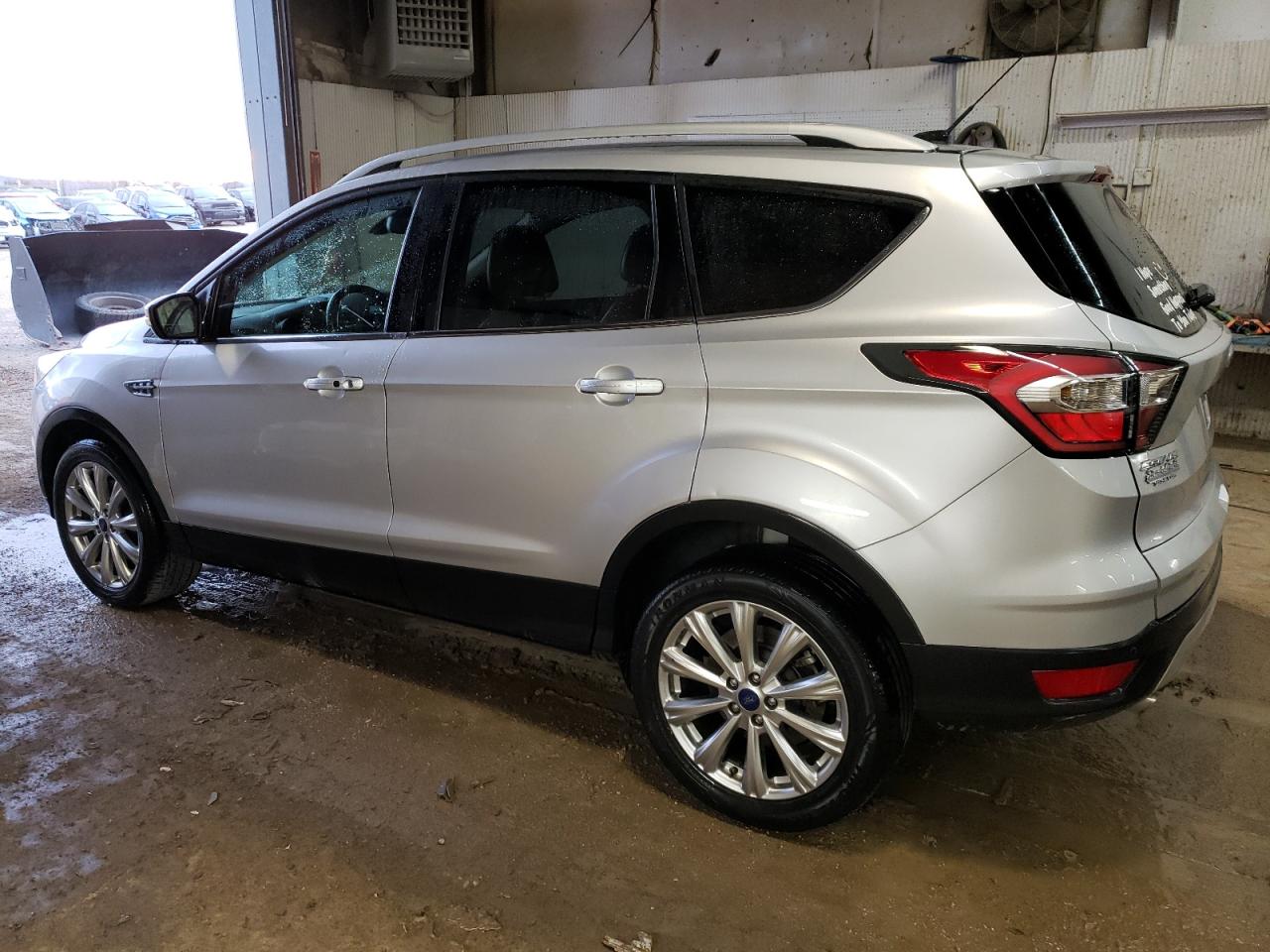 Obraz 2 z 2017 FORD ESCAPE TITANIUM 2017 z VIN 1FMCU0J9XHUA63153