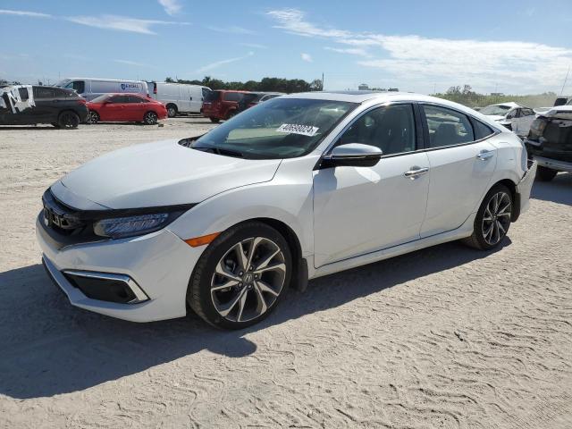 Image 1 of 2019 HONDA CIVIC TOURING 2019 with VIN JHMFC1F99KX005882