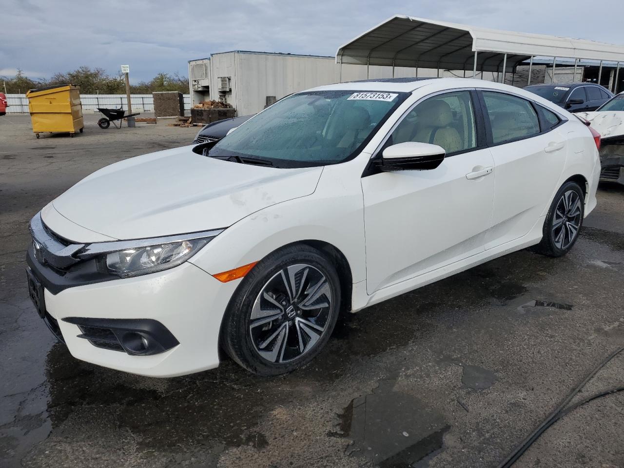 Изображение 1 2018 HONDA CIVIC EXL 2018 с VIN JHMFC1F77JX014853