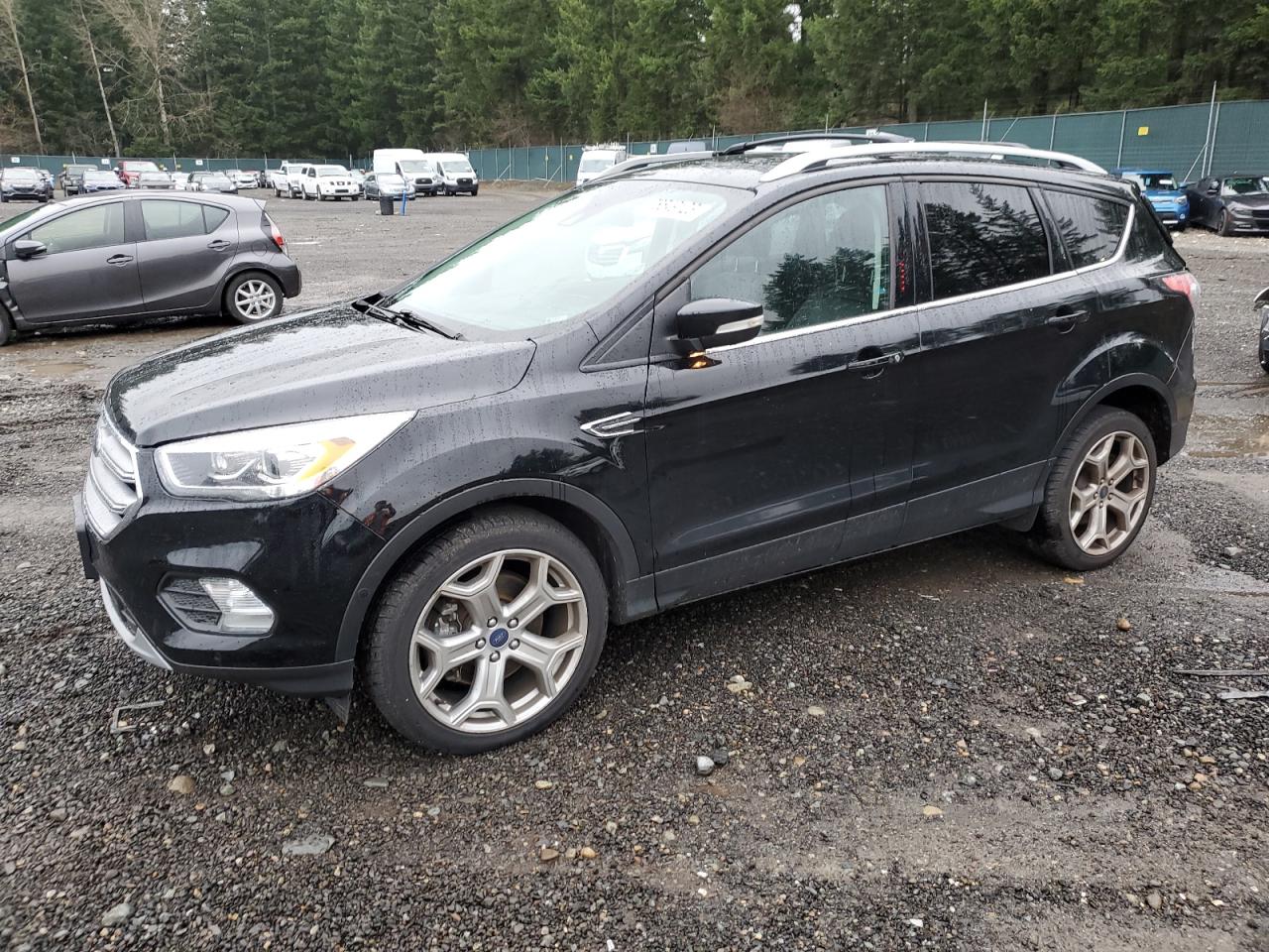 Obraz 1 z 2017 FORD ESCAPE TITANIUM 2017 z VIN 1FMCU9J9XHUA62069