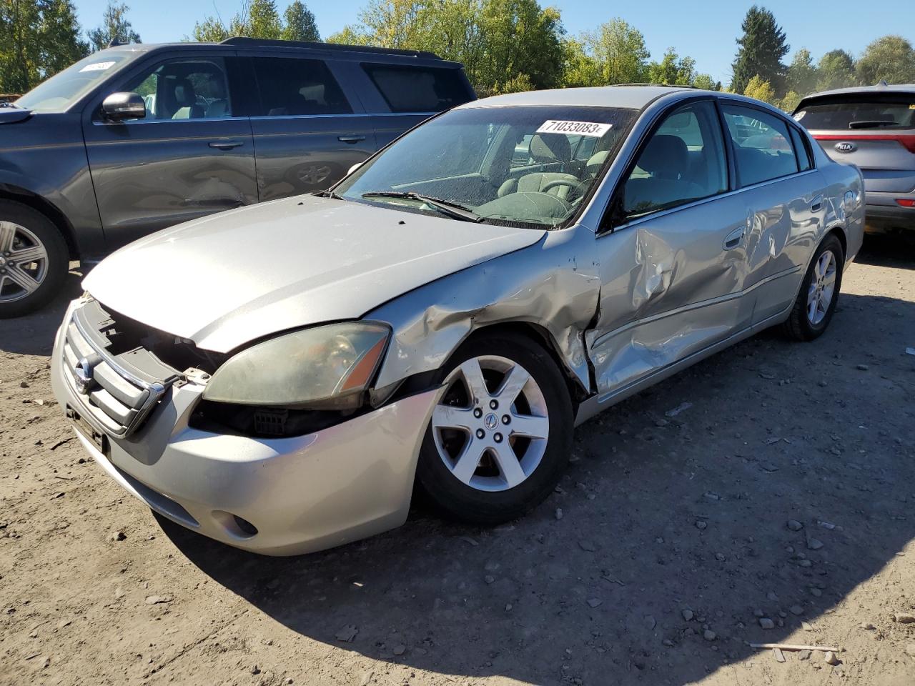 Obraz 1 z 2002 NISSAN ALTIMA BASE 2002 z VIN 1N4AL11D72C123773