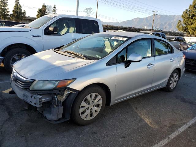 Obraz 1 z 2012 HONDA CIVIC LX 2012 z VIN 2HGFB2F57CH326950