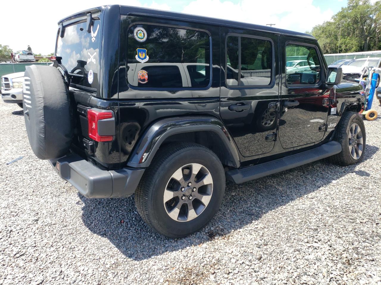 Image 3 of Jeep Wrangler Unlimited Sahara 2018 with VIN 1C4HJXEN2JW266535