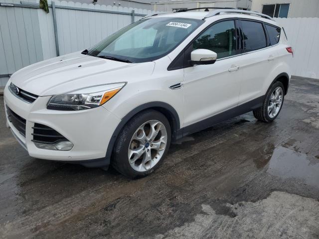Image 1 of 2014 FORD ESCAPE TITANIUM 2014 with VIN 1FMCU0J99EUB47878