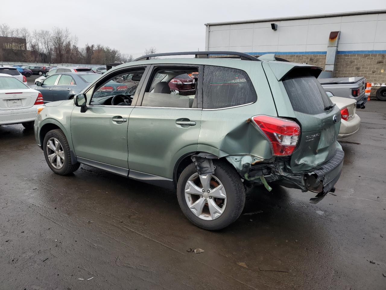 Image 2 of 2016 SUBARU FORESTER 2.5I LIMITED 2016 with VIN JF2SJARC6GH478462