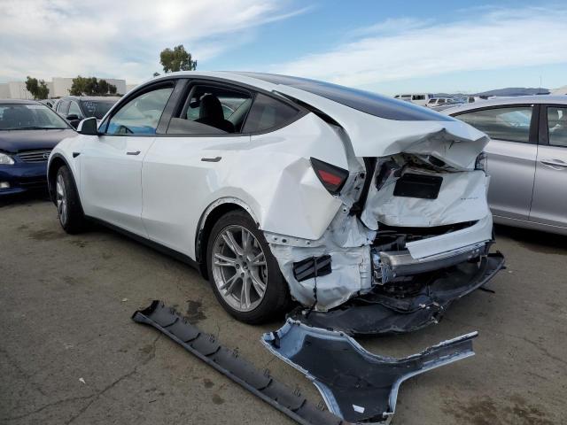 Изображение 2 2023 TESLA MODEL Y  2023 с VIN 7SAYGDEE2PA124793