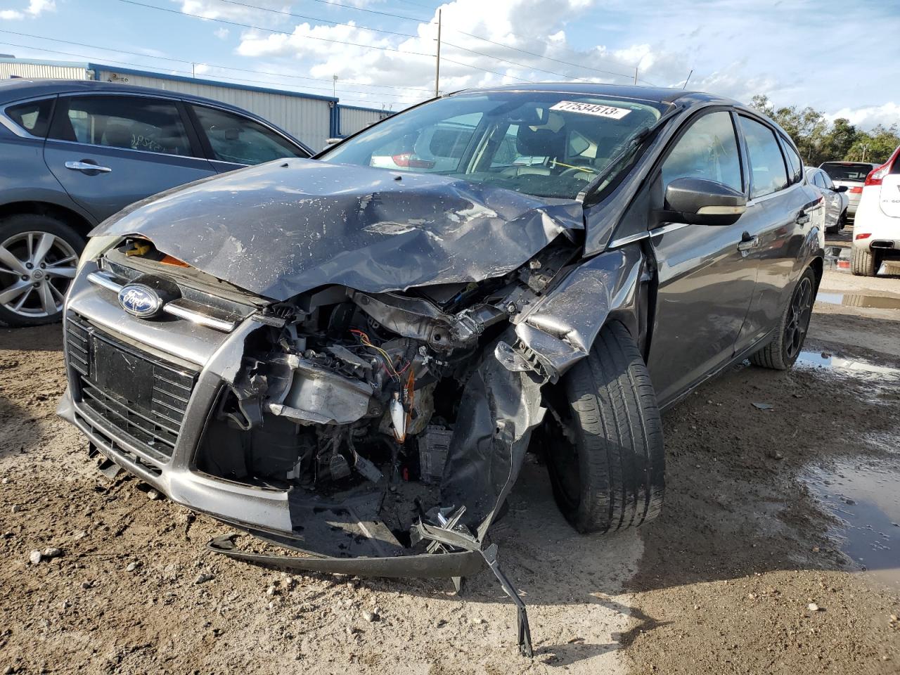 Image 1 of 2012 FORD FOCUS TITANIUM 2012 with VIN 1FAHP3N26CL474103