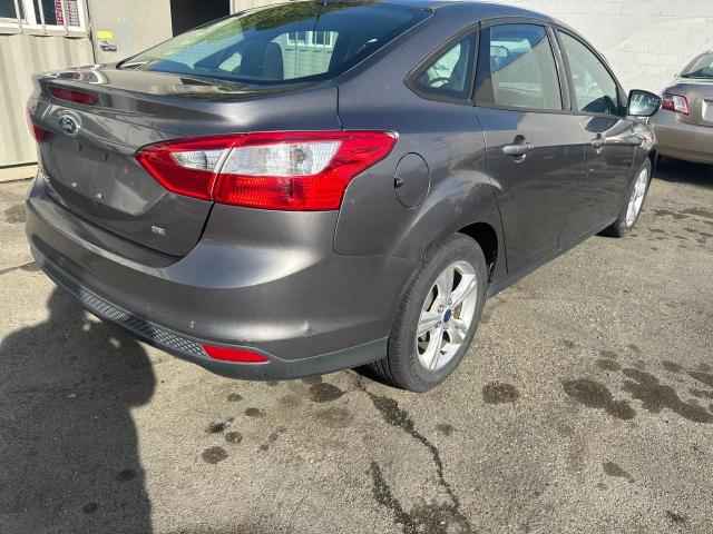 Image 3 of 2013 FORD FOCUS SE 2013 with VIN 1FADP3F29DL352771