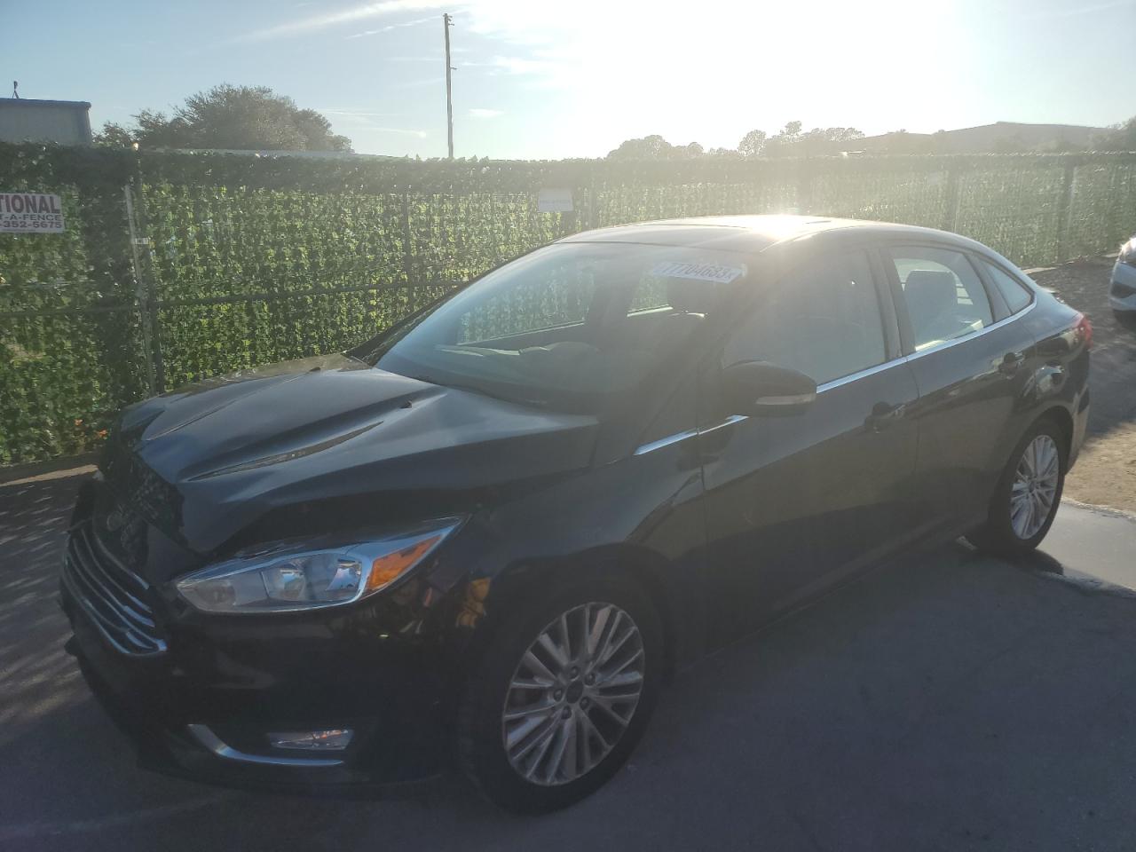 Image 1 of 2018 FORD FOCUS TITANIUM 2018 with VIN 1FADP3J29JL293935