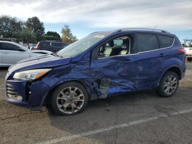 Image 1 of 2014 FORD ESCAPE TITANIUM 2014 with VIN 1FMCU0JX9EUB85061