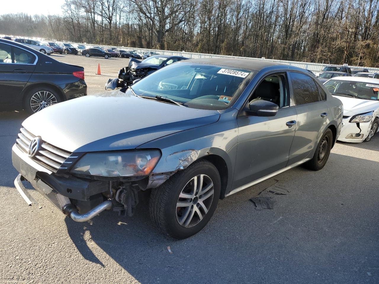 Image 1 of 2014 VOLKSWAGEN PASSAT S 2014 with VIN 1VWAT7A37EC049700
