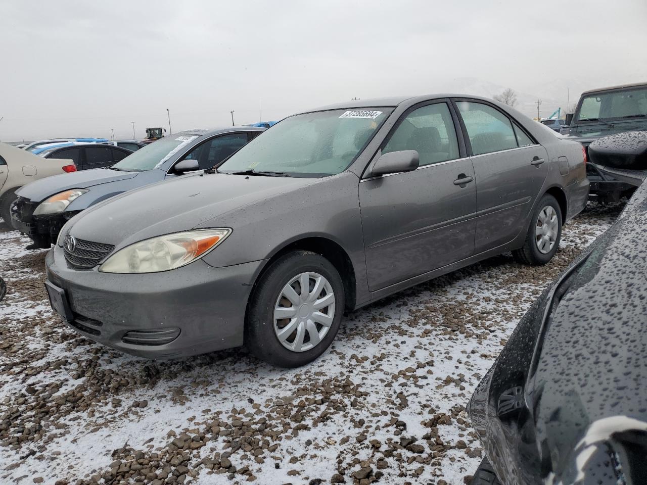 Obraz 1 z 2003 TOYOTA CAMRY LE 2003 z VIN JTDBE32K230140422