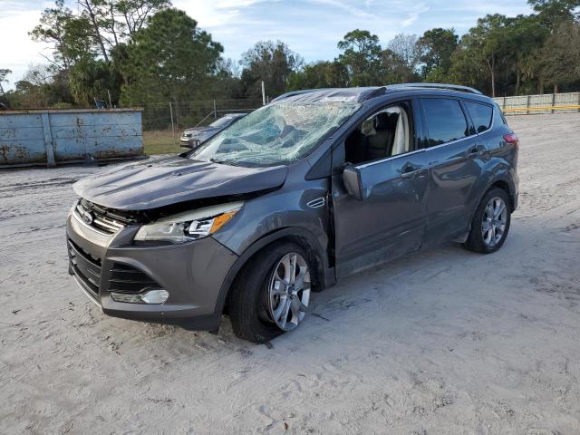 Image 1 of 2014 FORD ESCAPE TITANIUM 2014 with VIN 1FMCU9J93EUA83115