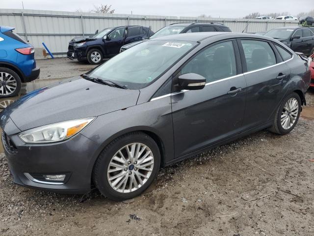 Image 1 of 2015 FORD FOCUS TITANIUM 2015 with VIN 1FADP3J20FL254884