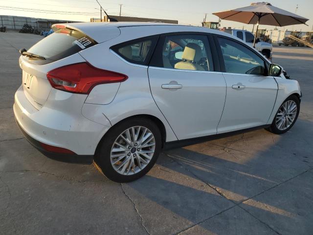 Image 3 of 2016 FORD FOCUS TITANIUM 2016 with VIN 1FADP3N27GL230769