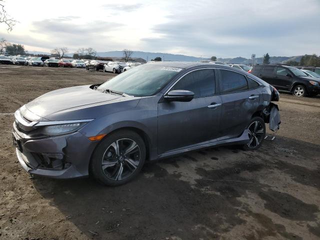 Obraz 1 z 2016 HONDA CIVIC TOURING 2016 z VIN 19XFC1F97GE218693