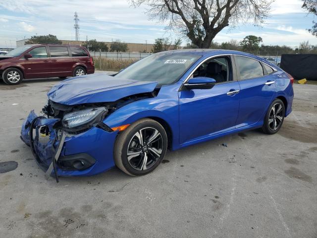 Obraz 1 z 2017 HONDA CIVIC TOURING 2017 z VIN 19XFC1F97HE018673