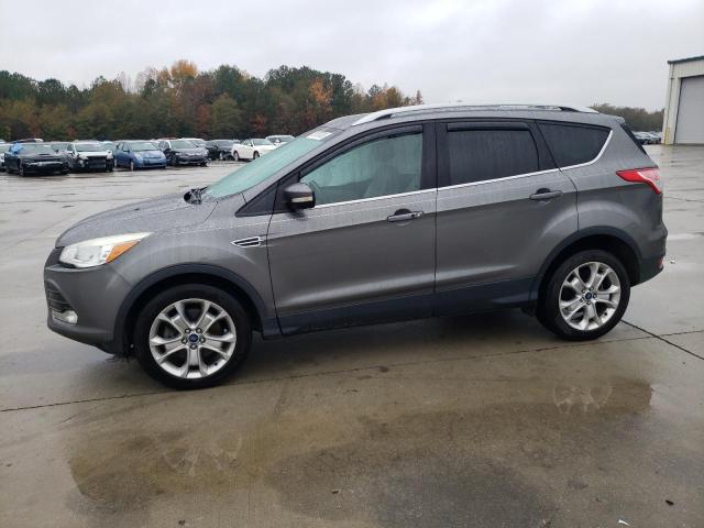 Image 1 of 2014 FORD ESCAPE TITANIUM 2014 with VIN 1FMCU9J98EUD53004