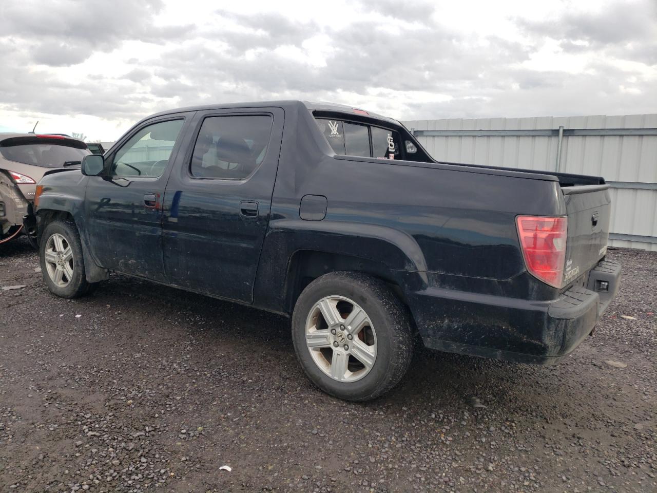 Obraz 2 z 2011 HONDA RIDGELINE RTL 2011 z VIN 5FPYK1F59BB001388