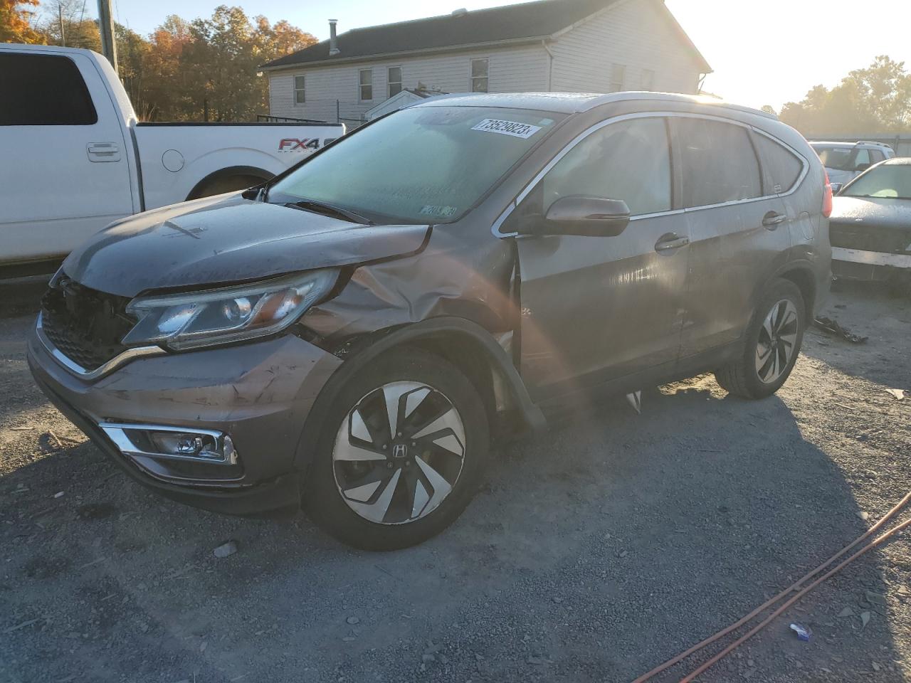 Image 1 of 2016 HONDA CR-V TOURING 2016 with VIN 5J6RM4H9XGL015727