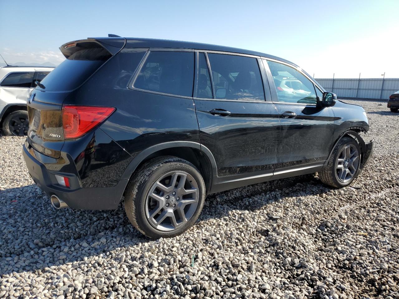 Изображение 3 2022 HONDA PASSPORT EXL 2022 с VIN 5FNYF8H52NB030478
