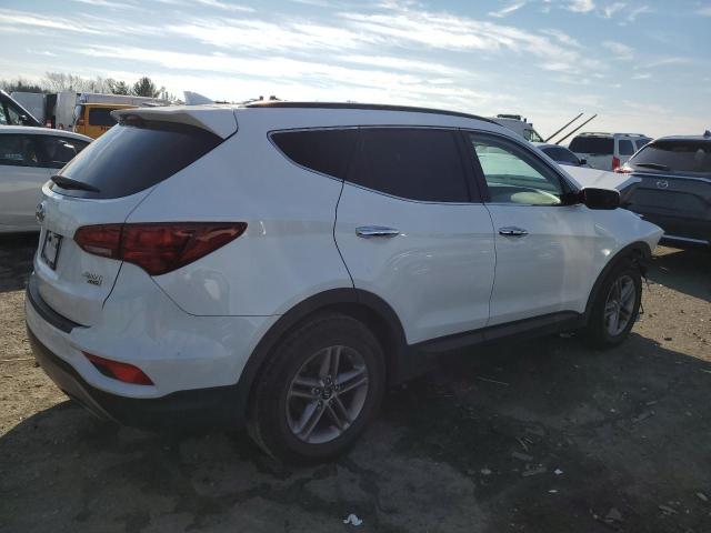 Image 3 of 2017 Hyundai Santa Fe 2017 with VIN 5NMZUDLB6HH026520