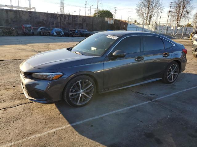 Image 1 of 2022 HONDA CIVIC TOURING 2022 with VIN 2HGFE1F96NH324386