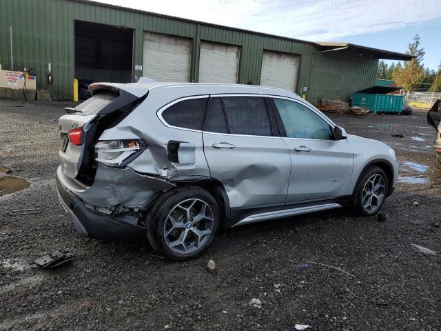 Obraz 3 z 2018 BMW X1 XDRIVE28I 2018 z VIN WBXHT3C38J5K25114