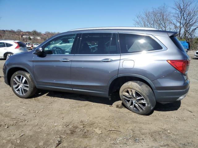 Изображение 2 2018 HONDA PILOT TOURING 2018 с VIN 5FNYF6H98JB008132