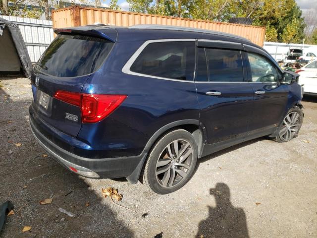 Obraz 3 z Honda Pilot Touring 2016 z VIN 5FNYF6H99GB503240