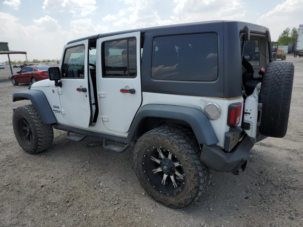 Изображение 2 2013 JEEP WRANGLER UNLIMITED SPORT 2013 с VIN 1C4BJWDG0DL583982