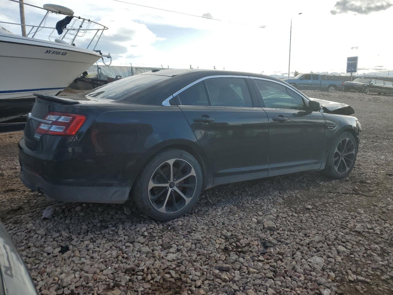 Obraz 3 z 2015 FORD TAURUS SHO 2015 z VIN 1FAHP2KT0FG128763