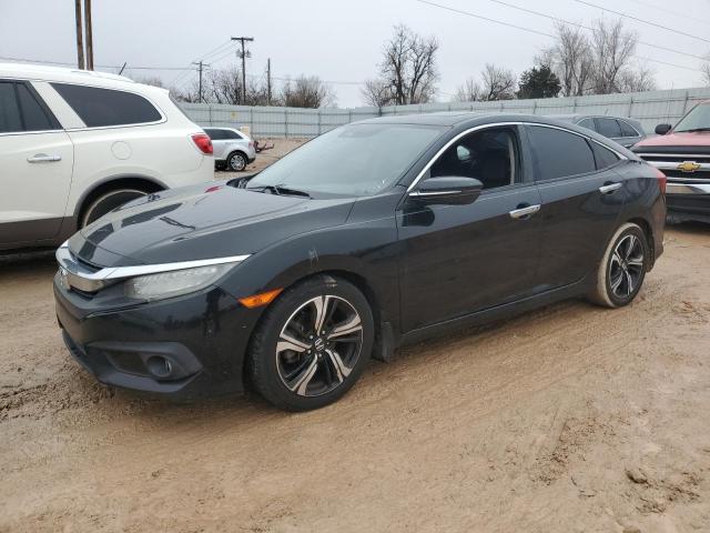 Obraz 1 z 2017 HONDA CIVIC TOURING 2017 z VIN 19XFC1F98HE017533