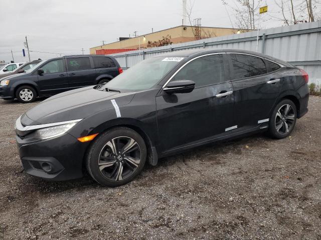 Изображение 1 2018 HONDA CIVIC TOURING 2018 с VIN 2HGFC1F93JH108317
