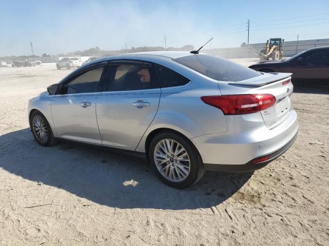 Изображение 2 2016 FORD FOCUS TITANIUM 2016 с VIN 1FADP3J22GL207471