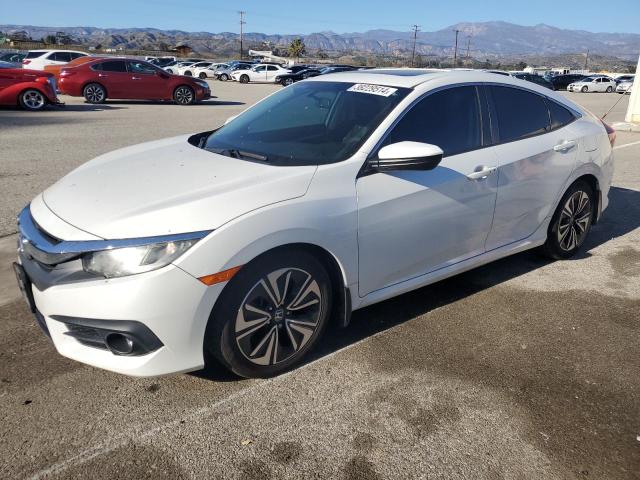 Obraz 1 z 2017 HONDA CIVIC EX 2017 z VIN 2HGFC1F34HH632159
