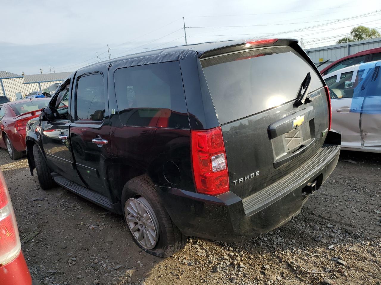 Изображение 2 2013 CHEVROLET TAHOE HYBRID 2013 с VIN 1GNSKDEJ3DR319641