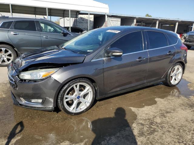 Image 1 of 2015 FORD FOCUS TITANIUM 2015 with VIN 1FADP3N20FL324474
