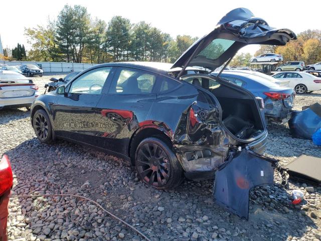 Изображение 2 2023 TESLA MODEL Y  2023 с VIN 7SAYGDEE6PA078952