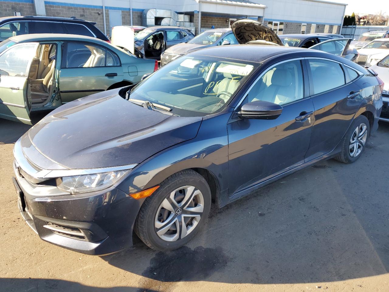 Obraz 1 z 2017 HONDA CIVIC LX 2017 z VIN 19XFC2F56HE228104