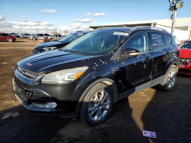 Image 1 of 2014 FORD ESCAPE TITANIUM 2014 with VIN 1FMCU9JX2EUB66579