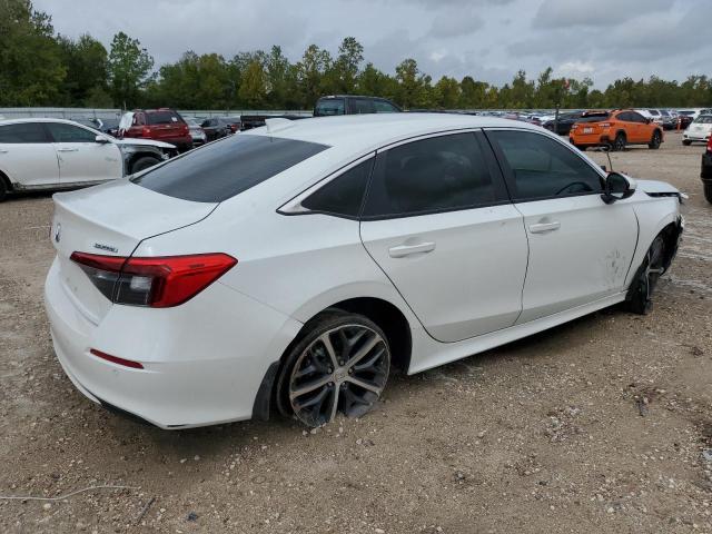 Изображение 3 2023 HONDA CIVIC TOURING 2023 с VIN 2HGFE1F98PH305289