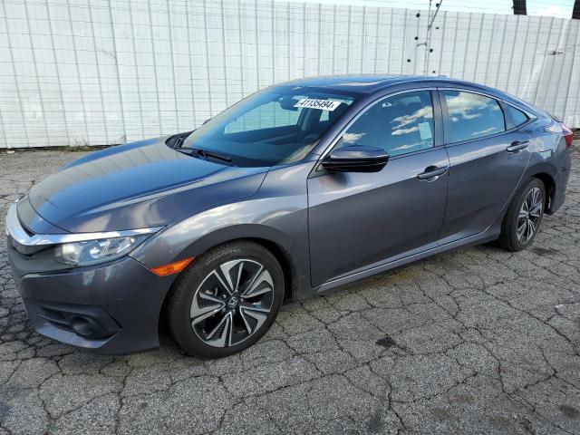 Obraz 1 z 2017 HONDA CIVIC EX 2017 z VIN 19XFC1F32HE211955